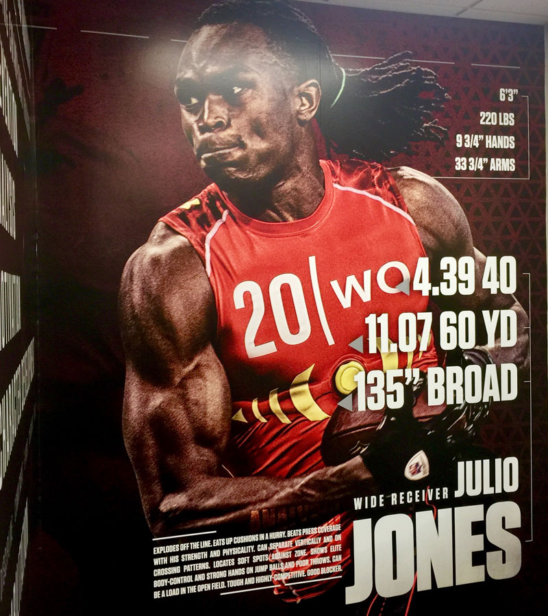 Large-format University of Alabama athletic wall wrap featuring Crimson Tide branding, expertly applied to a textured interior wall by a 3M Certified Installer.